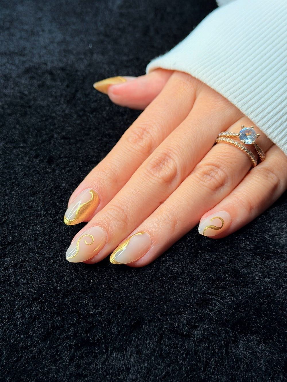 Nailora Paris — Octavie — Medium Almond Nude Gold Swirls press-on nails — open hand