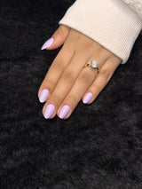 Close-up of Sixtine soft lilac almond press on nails