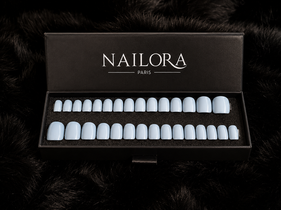 Close-up of Angèle ice blue square press on nails