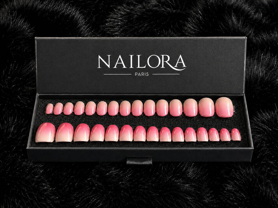Close-up of Aurélie pink ombré round press on nails