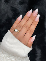Camille long almond nude metallic press on nails on hand – Nailora Paris