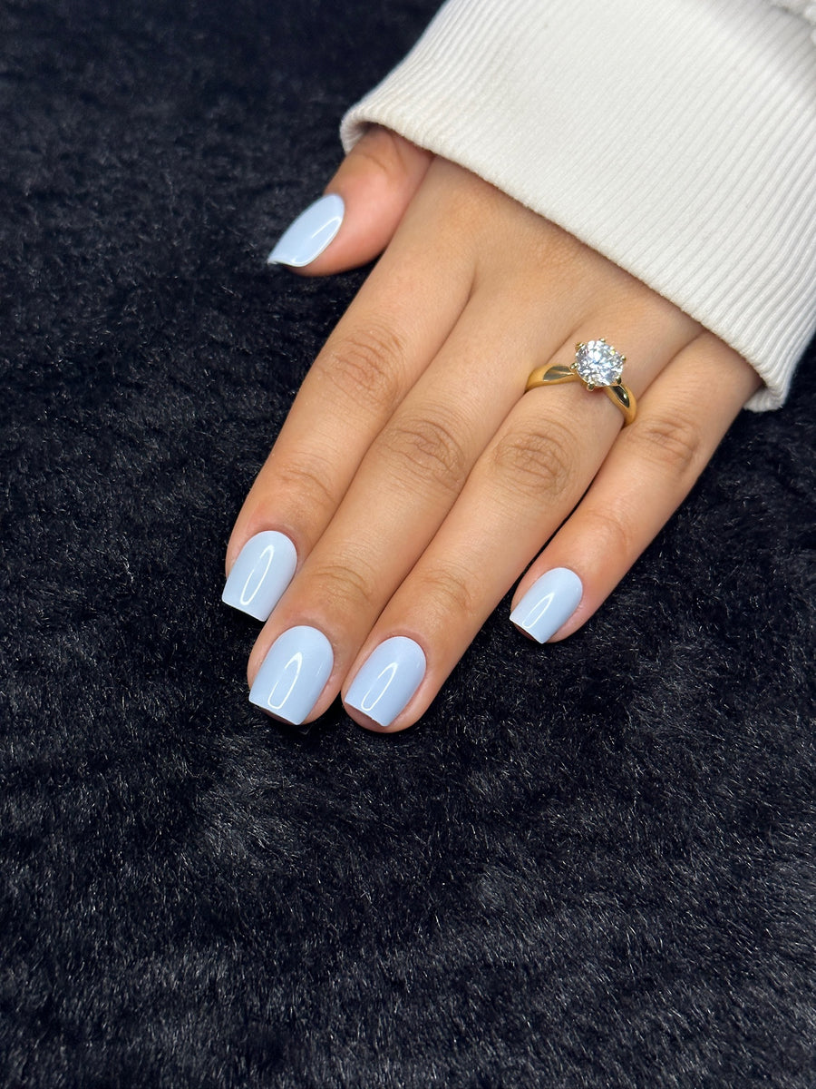 Close-up of Clémence powder blue square press on nails