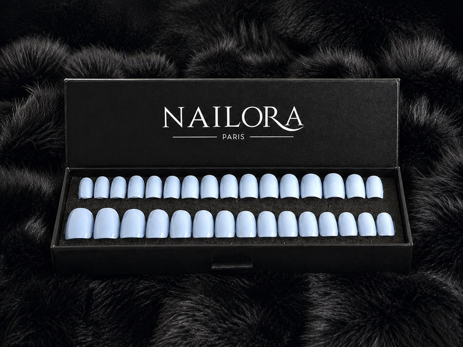 Clémence press on nails set with Nailora Paris packaging box