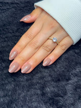 Close-up of Coralie mauve almond press on nails