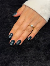 Close-up of Daphné teal almond press on nails