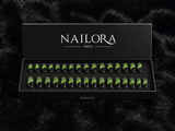 Close-up of Emma green metallic square press on nails