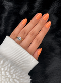 Estelle short almond coral press on nails on hand – Nailora Paris
