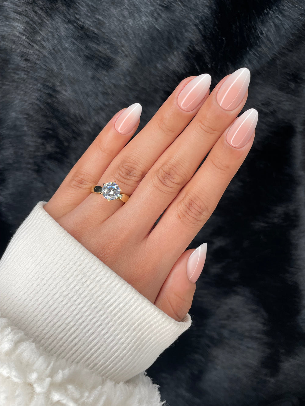 Gabrielle medium almond nude press on nails on hand – Nailora Paris