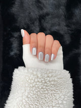 Inès silver metallic square press on nails hand pose – Nailora Paris