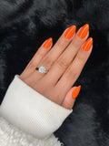 Joséphine medium almond neon orange press on nails on hand – Nailora Paris