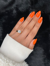 Joséphine medium almond neon orange press on nails on hand – Nailora Paris