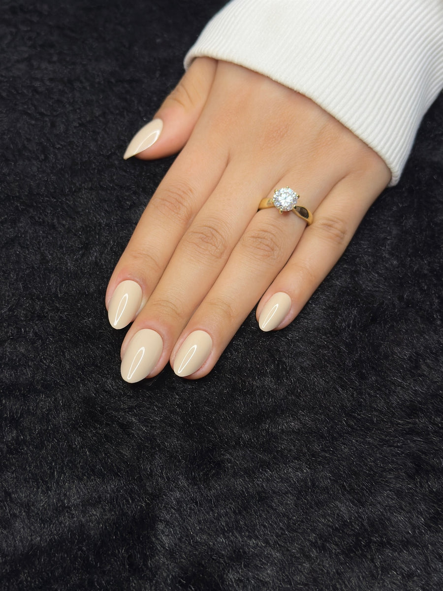 Close-up of Laure nude almond press on nails