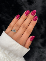 Léonie extra short round deep magenta glitter press on nails on hand – Nailora Paris
