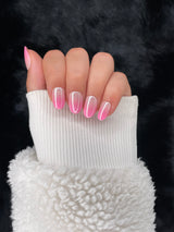 Margot pink ombre chrome almond press on nails hand pose – Nailora Paris
