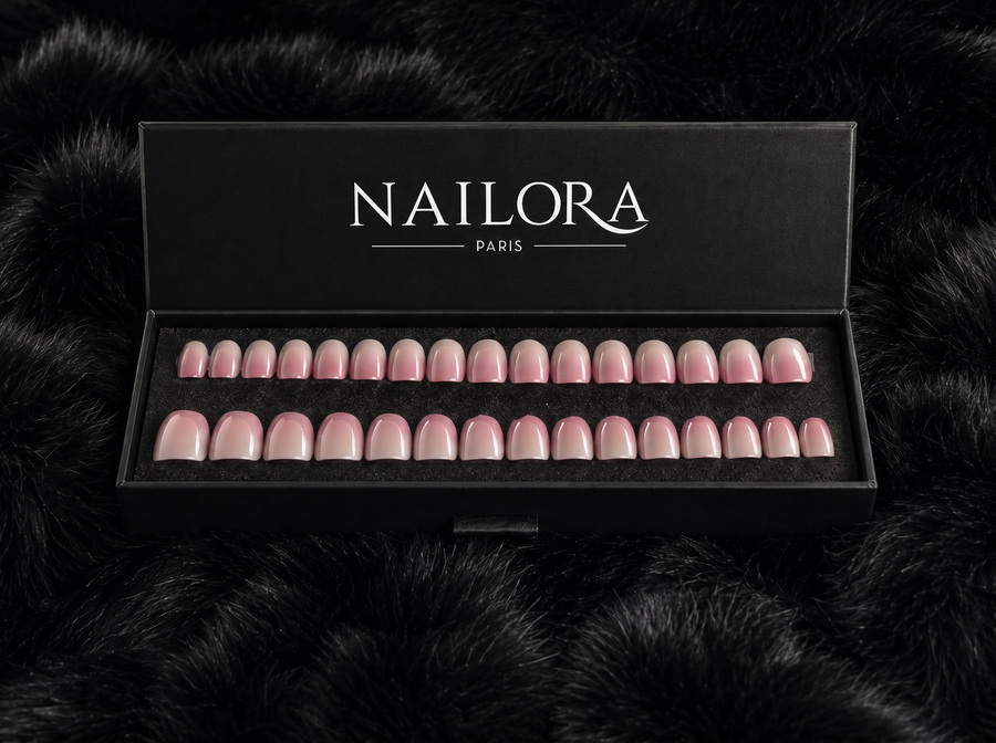 Close-up of Margot pink ombre chrome round press on nails