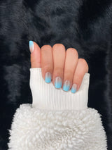 Brume white to blue gradient square nails closed fist view — Nailora Paris