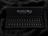 Onyx black press-on nails Nailora Paris box packaging