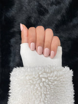 Sable nude blush short almond press on nails hand view 2 — Nailora Paris