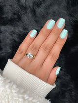 Céleste mint green press on nails on hand