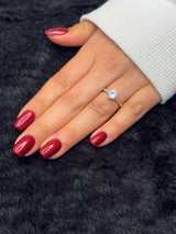 Close-up of Raphaëlle ruby red glitter square press on nails