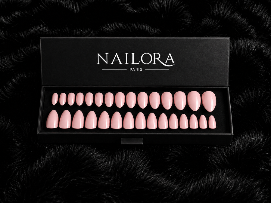 Close-up of Sophie nude pink almond press on nails