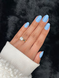 Yasmine short almond sky blue press on nails on hand – Nailora Paris