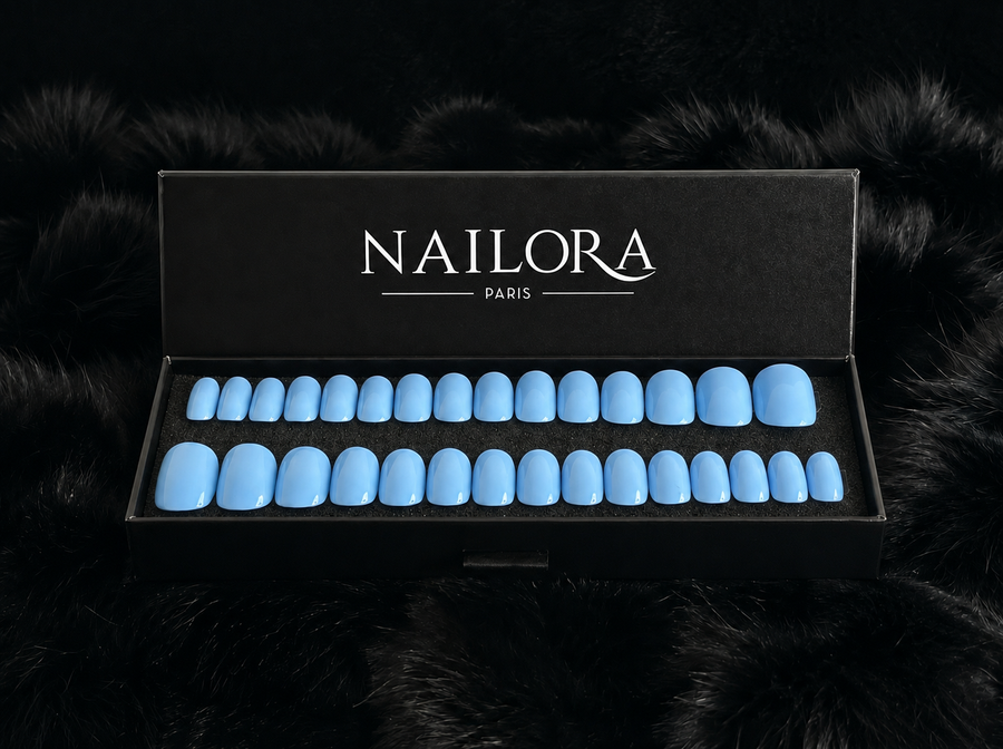 Close-up of Yasmine sky blue round press on nails